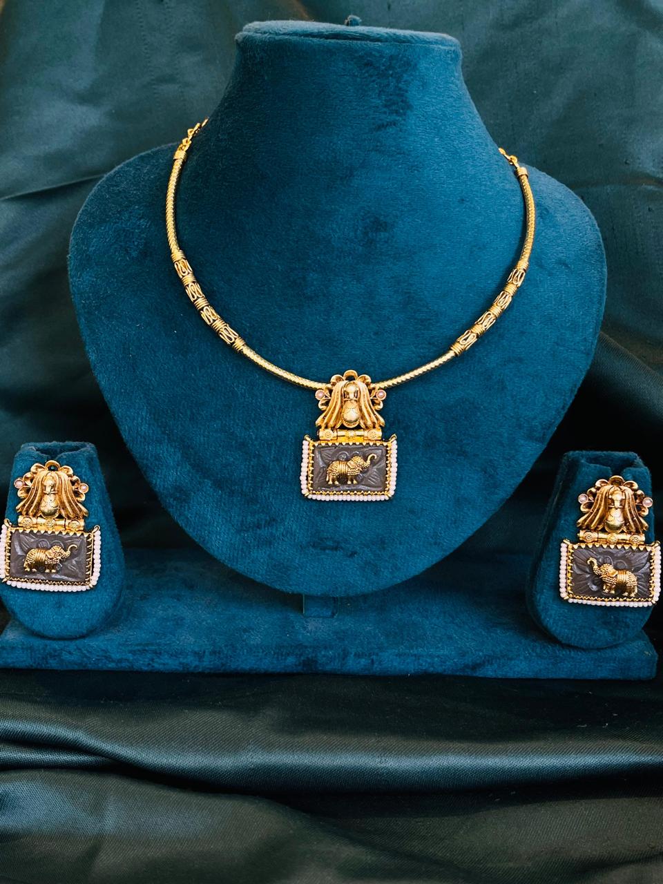 Handcrafted Tribal Lion & Elephant Pendant Set – Oxidised Dual Tone Finish